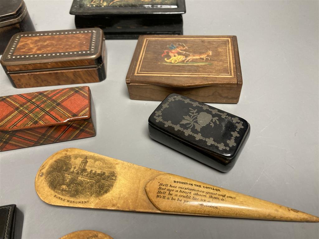 A collection of snuff boxes, mostly 19th century, including horn, tartan, mauchline, black papier mache and other treen